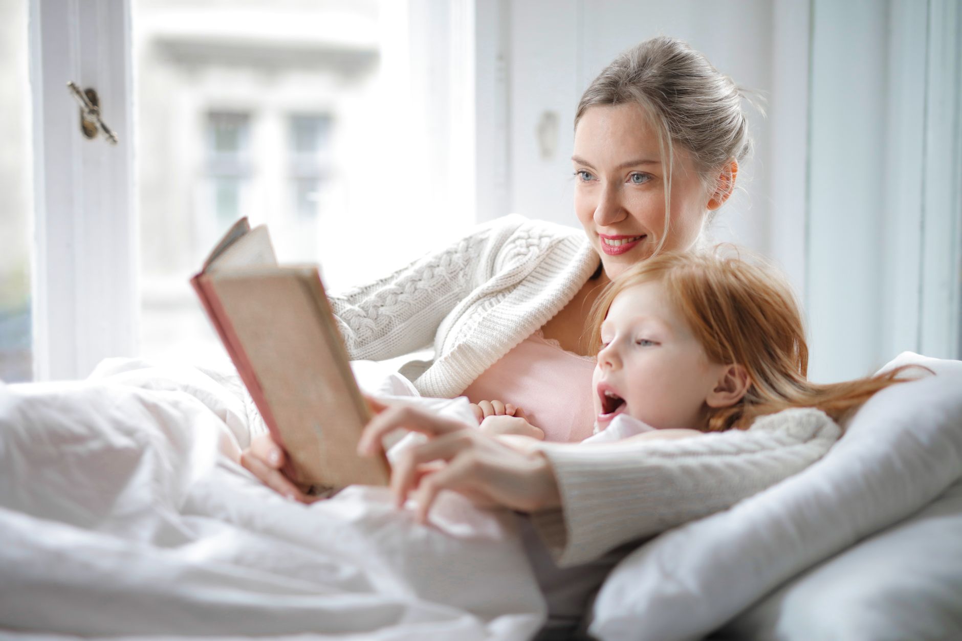 A parent calmly reading with their child
