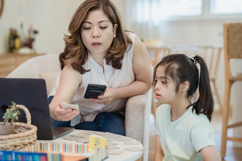 A parent and child going over the week together at home
